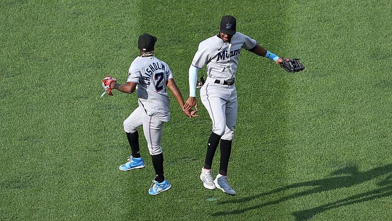 Sep 15, 2021; Washington, District of Columbia, USA; Miami Marlins second baseman Jazz Chisholm Jr. (2) celebrates with Marlins right fielder Lewis Brinson (25) after their game against the Washington Nationals at Nationals Park. Mandatory Credit: Geoff Burke-USA TODAY Sports