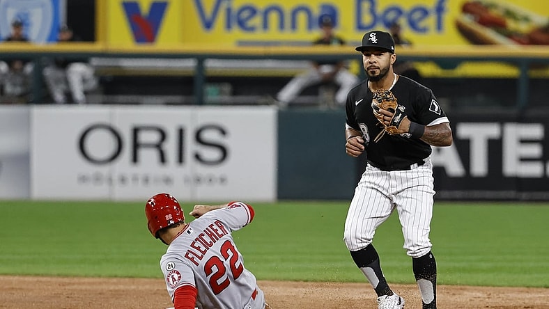 Sep 15, 2021; Chicago, Illinois, USA; Los Angeles Angels third baseman David Fletcher (22) steals second base against Chicago White Sox left fielder Leury Garcia (28) during the third inning at Guaranteed Rate Field. Mandatory Credit: Kamil Krzaczynski-USA TODAY Sports