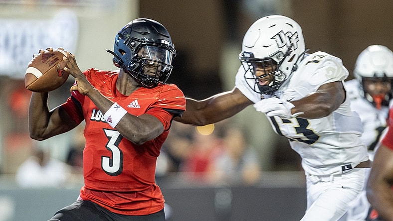 UofL quarterback Malik Cunningham is sacked during the first half Friday evening as the Louisville Cardinals took on the University of Central Florida at Cardinal Stadium. The Cardinals led 21-14 at halftime. Sept. 17, 2021

As 4148 Uofl Ucf 1sthalf351