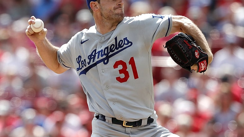 Sep 18, 2021; Cincinnati, Ohio, USA; Los Angeles Dodgers starting pitcher Max Scherzer (31) throws a pitch against the Cincinnati Reds during the first inning at Great American Ball Park. Mandatory Credit: David Kohl-USA TODAY Sports