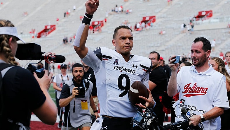Cincinnati Bearcats quarterback Desmond Ridder (9) runs for the locker room after the Bearcats win in the fourth quarter of the NCAA football game between the Indiana Hoosiers and the Cincinnati Bearcats at Memorial Stadium in Bloomington, Ind., on Saturday, Sept. 18, 2021. The Bearcats won 38-24.

Cincinnati Bearcats At Indiana Hoosiers Football