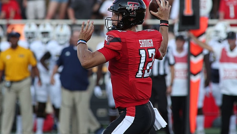 Sep 18, 2021; Lubbock, Texas, USA; Texas Tech Red Raiders quarterback Tyler Shough (12) throws a pass against the Florida International Panthers in the first half at Jones AT&T Stadium. Mandatory Credit: Michael C. Johnson-USA TODAY Sports