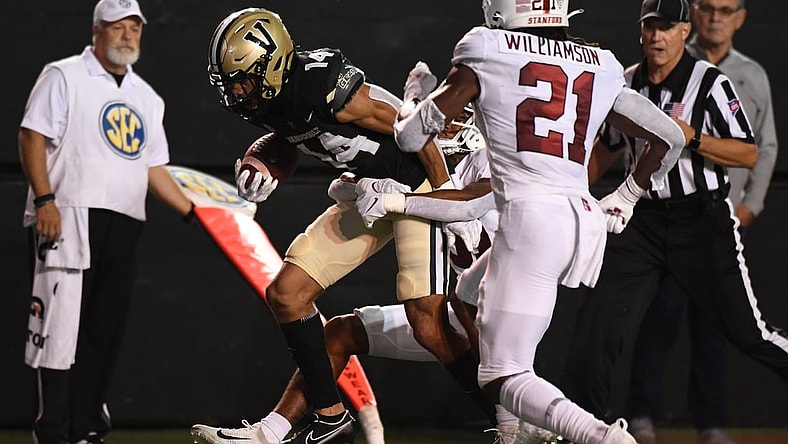 Sep 18, 2021; Nashville, Tennessee, USA; Vanderbilt Commodores wide receiver Will Sheppard (14) runs for a first down after a reception during the first half against the Stanford Cardinal at Vanderbilt Stadium. Mandatory Credit: Christopher Hanewinckel-USA TODAY Sports