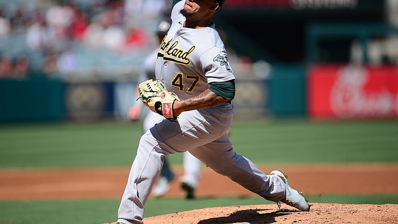Sep 19, 2021; Anaheim, California, USA; Oakland Athletics starting pitcher Frankie Montas (47) throws against the Los Angeles Angels during the second inning at Angel Stadium. Mandatory Credit: Gary A. Vasquez-USA TODAY Sports