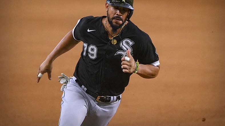 Sep 19, 2021; Arlington, Texas, USA; Chicago White Sox designated hitter Jose Abreu (79) scores from second base during the seventh inning against the Texas Rangers at Globe Life Field. Mandatory Credit: Jerome Miron-USA TODAY Sports