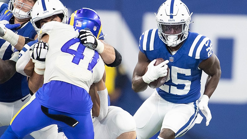 Sep 19, 2021; Indianapolis, Indiana, USA; Indianapolis Colts running back Marlon Mack (25) runs the ball in the second half against the Los Angeles Rams at Lucas Oil Stadium. Mandatory Credit: Trevor Ruszkowski-USA TODAY Sports