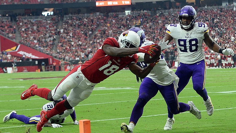 Sep 19, 2021; Glendale, Arizona, USA; Arizona Cardinals wide receiver A.J. Green (18) dives for a touchdown against the Minnesota Vikings during the second half at State Farm Stadium. Mandatory Credit: Joe Camporeale-USA TODAY Sports