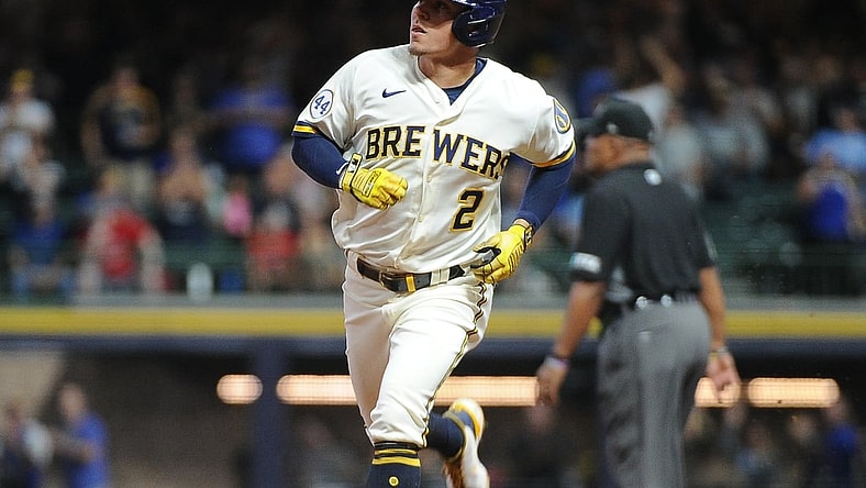Sep 20, 2021; Milwaukee, Wisconsin, USA;  Milwaukee Brewers third baseman Luis Urias (2) rounds the bases after hitting a home run against the St. Louis Cardinals in the second inning at American Family Field. Mandatory Credit: Michael McLoone-USA TODAY Sports