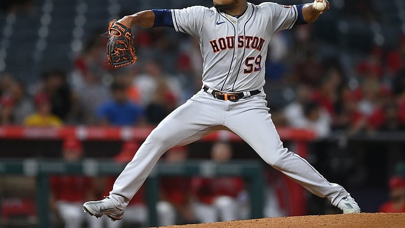 Sep 20, 2021; Anaheim, California, USA;  Houston Astros starting pitcher Framber Valdez (59) throws in the second inning of the game against the Los Angeles Angels at Angel Stadium. Mandatory Credit: Jayne Kamin-Oncea-USA TODAY Sports