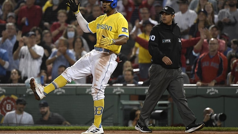 Sep 21, 2021; Boston, Massachusetts, USA;  Boston Red Sox shortstop Xander Bogaerts (2) reacts after hitting a RBI single against the New York Mets during the sixth inning at Fenway Park. Mandatory Credit: Bob DeChiara-USA TODAY Sports