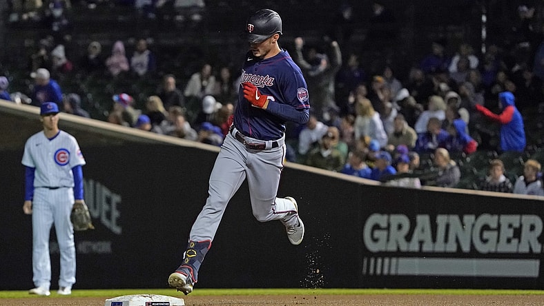 Sep 22, 2021; Chicago, Illinois, USA; Minnesota Twins left fielder Max Kepler (26) runs the bases after hitting a home run against the Chicago Cubs during the fourth inning at Wrigley Field. Mandatory Credit: David Banks-USA TODAY Sports