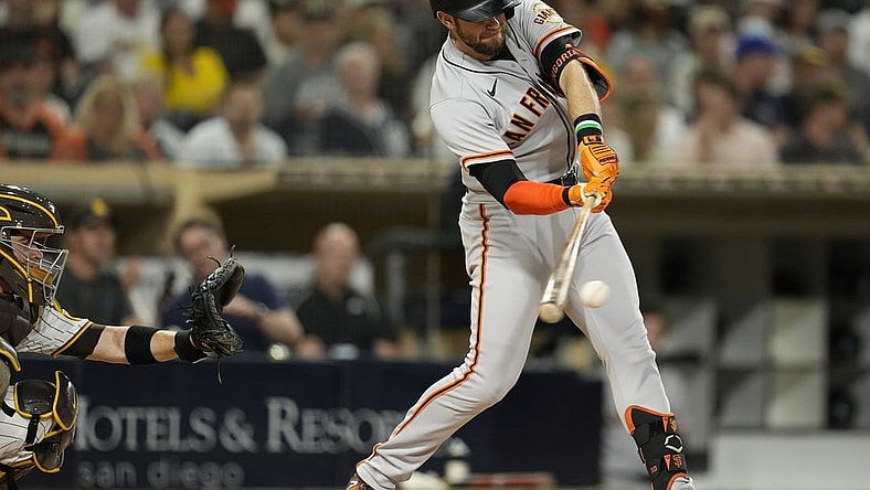 Sep 22, 2021; San Diego, California, USA; San Francisco Giants third baseman Evan Longoria (10) singles against the San Diego Padres during the fourth inning at Petco Park. Mandatory Credit: Ray Acevedo-USA TODAY Sports