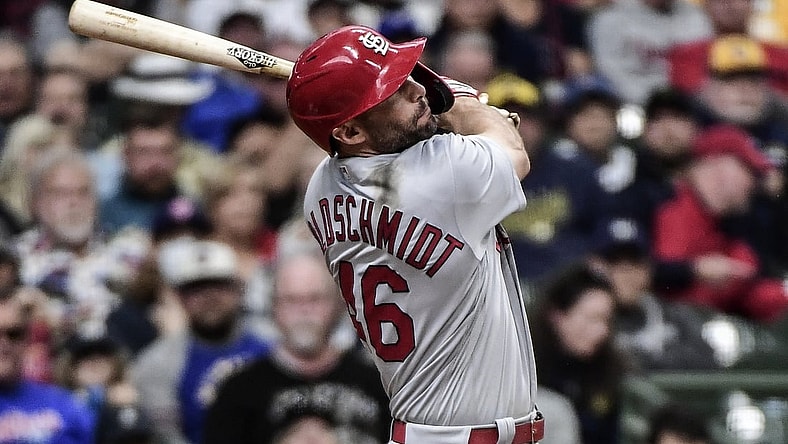 Sep 23, 2021; Milwaukee, Wisconsin, USA; St. Louis Cardinals first baseman Paul Goldschmidt (46) hits a solo home run in the ninth inning against the Milwaukee Brewers at American Family Field. Mandatory Credit: Benny Sieu-USA TODAY Sports