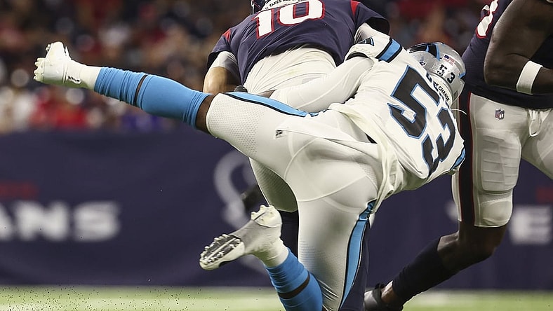 Sep 23, 2021; Houston, Texas, USA; Carolina Panthers defensive end Brian Burns (53) sacks Houston Texans quarterback Davis Mills (10) during the second quarter at NRG Stadium. Mandatory Credit: Troy Taormina-USA TODAY Sports