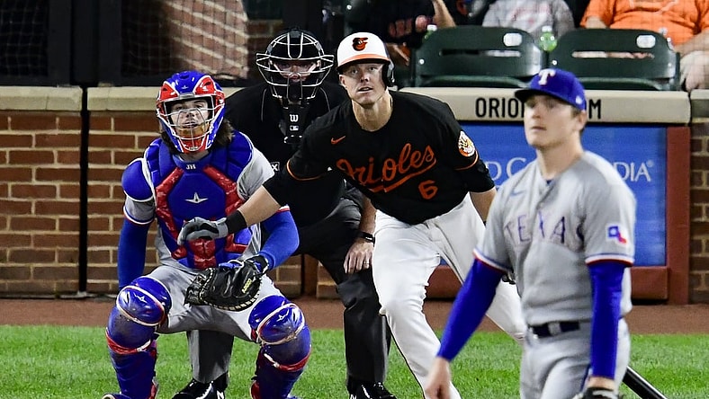 Sep 24, 2021; Baltimore, Maryland, USA; Baltimore Orioles third baseman Ryan Mountcastle (6) singles off Texas Rangers starting pitcher Spencer Howard (31) during the first inning  at Oriole Park at Camden Yards. Mandatory Credit: Tommy Gilligan-USA TODAY Sports