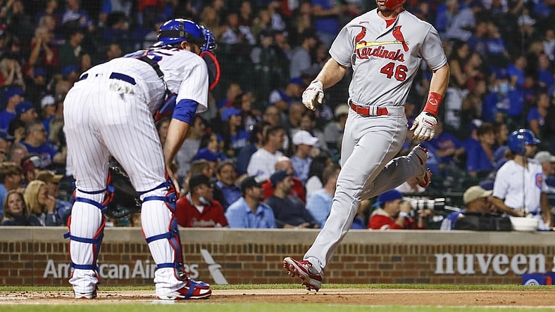 Sep 24, 2021; Chicago, Illinois, USA; St. Louis Cardinals first baseman Paul Goldschmidt (46) scores against the Chicago Cubs during the first inning of game 2 of a doubleheader at Wrigley Field. Mandatory Credit: Kamil Krzaczynski-USA TODAY Sports