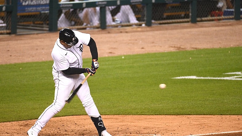 Sep 24, 2021; Detroit, Michigan, USA; Detroit Tigers designated hitter Miguel Cabrera (24) hits a single during the sixth inning against the Kansas City Royals at Comerica Park. Mandatory Credit: Tim Fuller-USA TODAY Sports