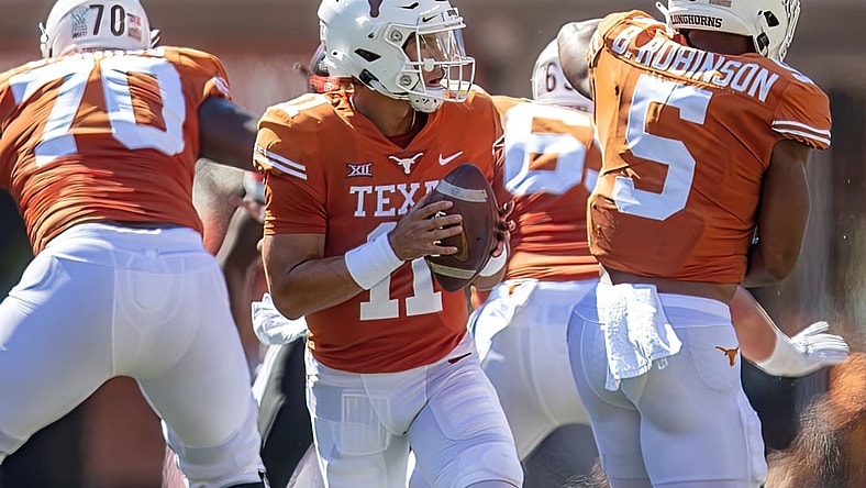 Sep 25, 2021; Austin, Texas, USA; Texas Longhorns quarterback Casey Thompson (11) looks to pass against the Texas Tech Red Raiders during the first quarter at Darrell K Royal-Texas Memorial Stadium. Mandatory Credit: John Gutierrez-USA TODAY Sports
