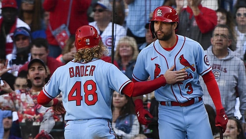 Sep 25, 2021; Chicago, Illinois, USA; St. Louis Cardinals center fielder Harrison Bader (48) celebrates with St. Louis Cardinals left fielder Dylan Carlson (3) after scoring during the seventh inning against the Chicago Cubs at Wrigley Field. Mandatory Credit: Matt Marton-USA TODAY Sports