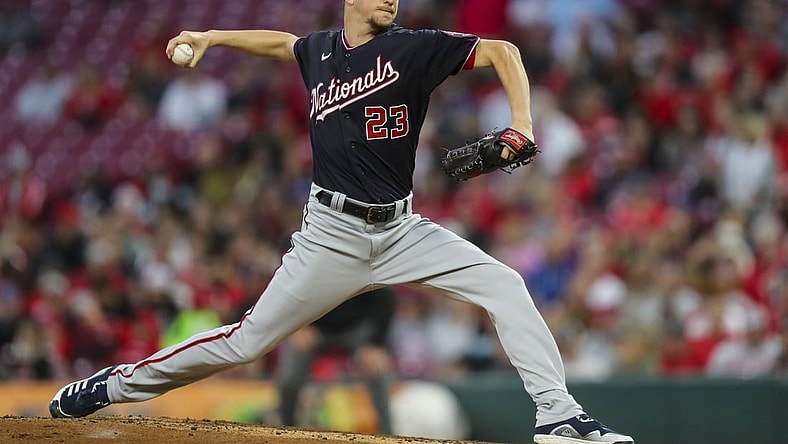Sep 25, 2021; Cincinnati, Ohio, USA; Washington Nationals starting pitcher Erick Fedde (23) throws a pitch against the Cincinnati Reds in the first inning at Great American Ball Park. Mandatory Credit: Katie Stratman-USA TODAY Sports