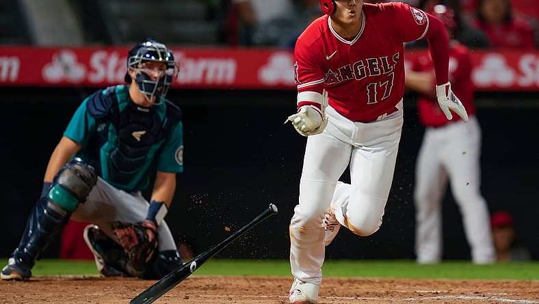 Sep 25, 2021; Anaheim, California, USA; Los Angeles Angels designated hitter Shohei Ohtani (17) triples against the Seattle Mariners in the third inning at Angel Stadium. Mandatory Credit: Robert Hanashiro-USA TODAY Sports