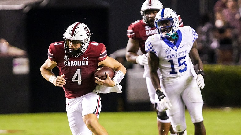 Sep 25, 2021; Columbia, South Carolina, USA; South Carolina Gamecocks quarterback Luke Doty (4) scrambles against the Kentucky Wildcats in the fourth quarter at Williams-Brice Stadium. Mandatory Credit: Jeff Blake-USA TODAY Sports