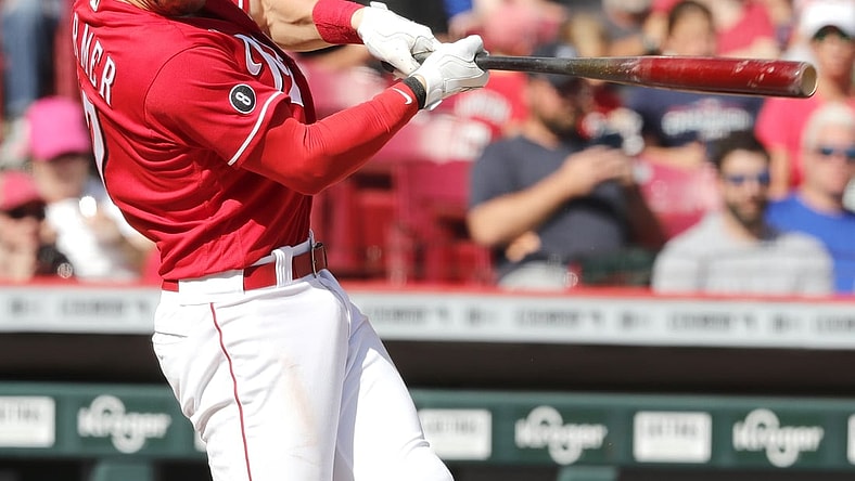 Sep 26, 2021; Cincinnati, Ohio, USA; Cincinnati Reds shortstop Kyle Farmer (17) hits a grand slam against the Washington Nationals during the sixth inning at Great American Ball Park. Mandatory Credit: David Kohl-USA TODAY Sports