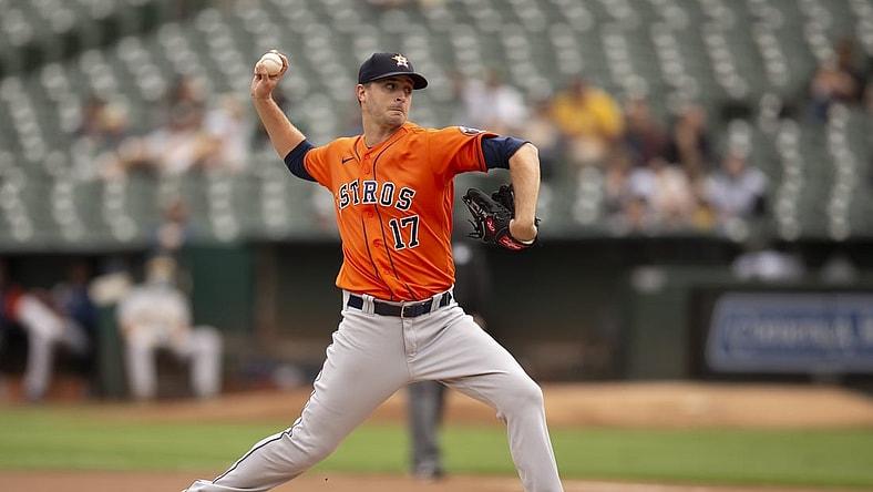Sep 26, 2021; Oakland, California, USA; Houston Astros starting pitcher Jake Odorizzi (17) delivers a pitch against the Oakland Athletics in the first inning at RingCentral Coliseum. Mandatory Credit: D. Ross Cameron-USA TODAY Sports