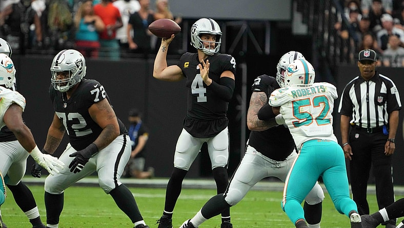 Sep 26, 2021; Paradise, Nevada, USA; Las Vegas Raiders quarterback Derek Carr (4) throws the ball in the first quarter against the Miami Dolphins at Allegiant Stadium. Mandatory Credit: Kirby Lee-USA TODAY Sports