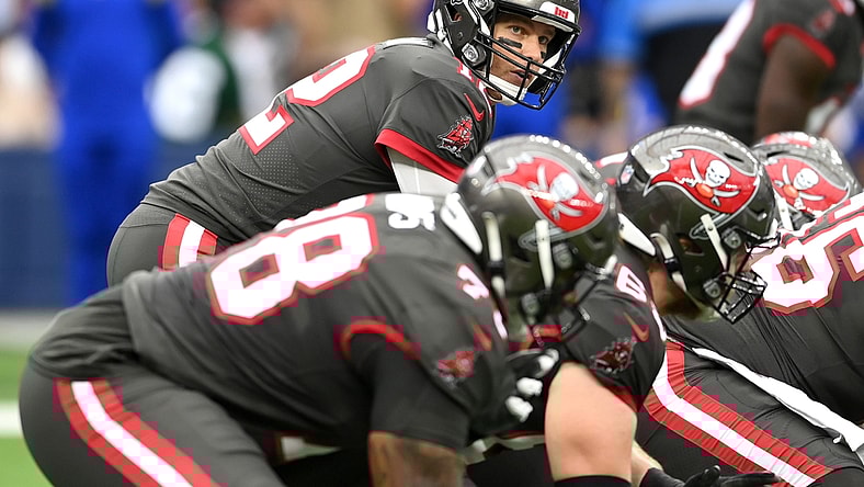 Sep 26, 2021; Inglewood, California, USA;   Tampa Bay Buccaneers quarterback Tom Brady (12) takes a snap in the first half of the game against the Los Angeles Rams at SoFi Stadium. Mandatory Credit: Jayne Kamin-Oncea-USA TODAY Sports