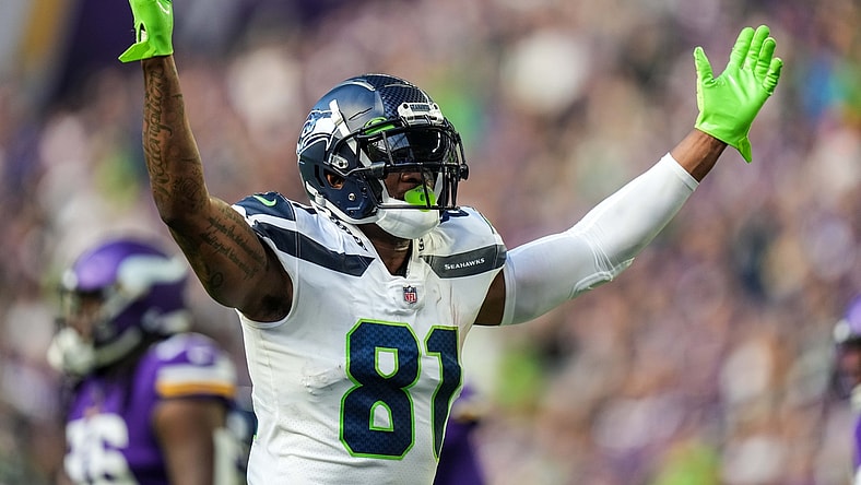 Sep 26, 2021; Minneapolis, Minnesota, USA; Seattle Seahawks tight end Gerald Everett (81) celebrates a touchdown scored by running back Chris Carson (not pictured) during the second quarter against Minnesota Vikings at U.S. Bank Stadium. Mandatory Credit: Brace Hemmelgarn-USA TODAY Sports