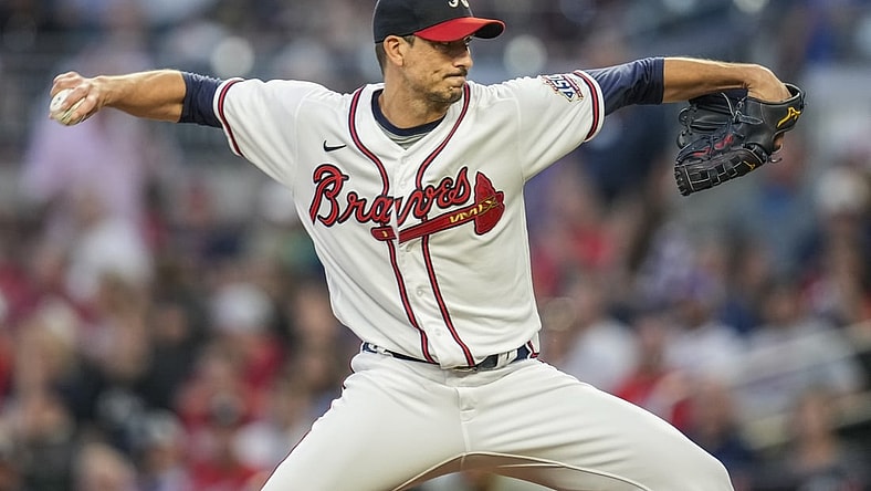 Sep 28, 2021; Cumberland, Georgia, USA; Atlanta Braves starting pitcher Charlie Morton (50) throws against the Philadelphia Phillies during the first inning at Truist Park. Mandatory Credit: Dale Zanine-USA TODAY Sports