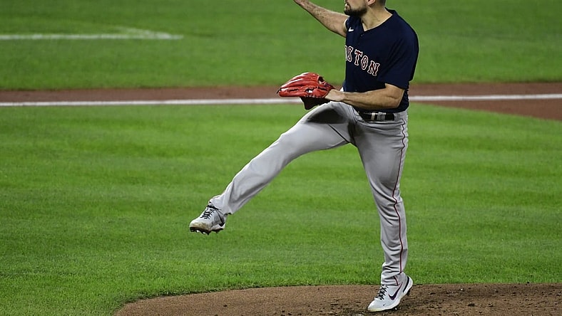 Sep 29, 2021; Baltimore, Maryland, USA; Boston Red Sox starting pitcher Nathan Eovaldi (17) follows through on a second inning pitch against the Baltimore Orioles  at Oriole Park at Camden Yards. Mandatory Credit: Tommy Gilligan-USA TODAY Sports