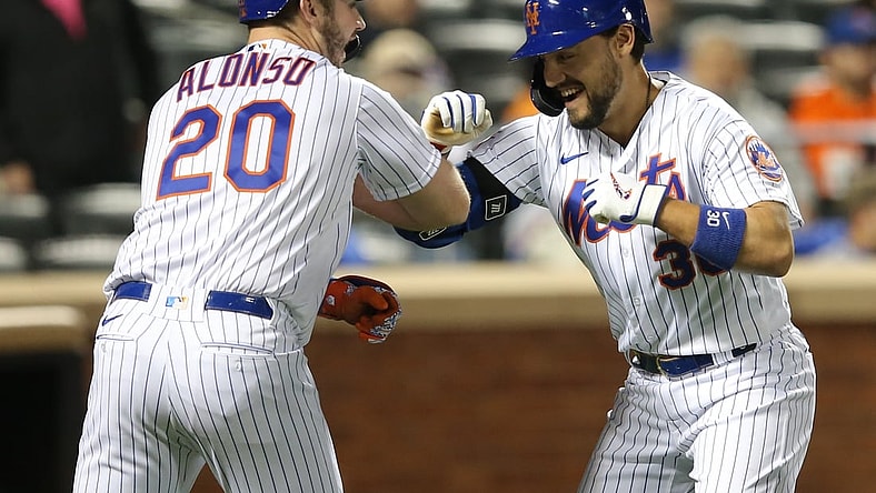 Sep 29, 2021; New York City, New York, USA; New York Mets right fielder Michael Conforto (30) celebrates with first baseman Pete Alonso (20) after hitting a solo home run against the Miami Marlins during the fourth inning at Citi Field. Mandatory Credit: Brad Penner-USA TODAY Sports