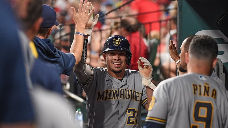 Sep 29, 2021; St. Louis, Missouri, USA; Milwaukee Brewers shortstop Willy Adames (27) celebrates after scoring a run against the St. Louis Cardinals during the first inning at Busch Stadium. Mandatory Credit: Joe Puetz-USA TODAY Sports