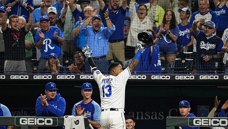 Sep 29, 2021; Kansas City, Missouri, USA; Kansas City Royals catcher Salvador Perez (13) celebrates after tying the franchise single season home run record during the first inning against the Cleveland Indians at Kauffman Stadium. Mandatory Credit: Jay Biggerstaff-USA TODAY Sports