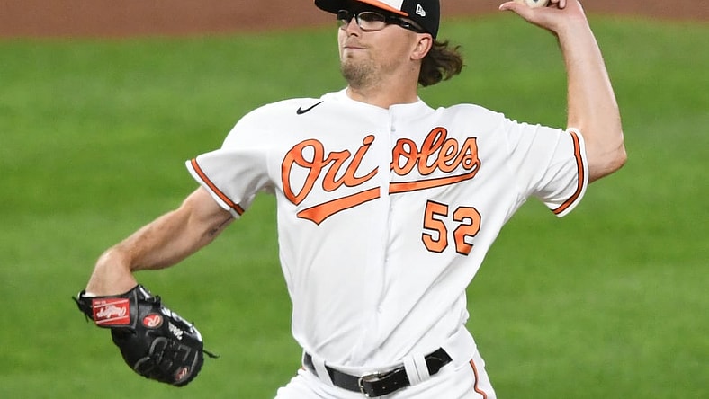 Sep 30, 2021; Baltimore, Maryland, USA; Baltimore Orioles relief pitcher Alexander Wells (52) pitches in the first inning during baseball game against the Boston Red Sox at Oriole Park at Camden Yards. Mandatory Credit: Mitchell Layton-USA TODAY Sports