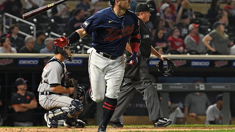 Sep 30, 2021; Minneapolis, Minnesota, USA;  Minnesota Twins infielder Josh Donaldson (20) flips his bat after hitting a three run home run off of Detroit Tigers starting pitcher Tarik Skubal (29) during the third inning at Target Field. Mandatory Credit: Nick Wosika-USA TODAY Sports