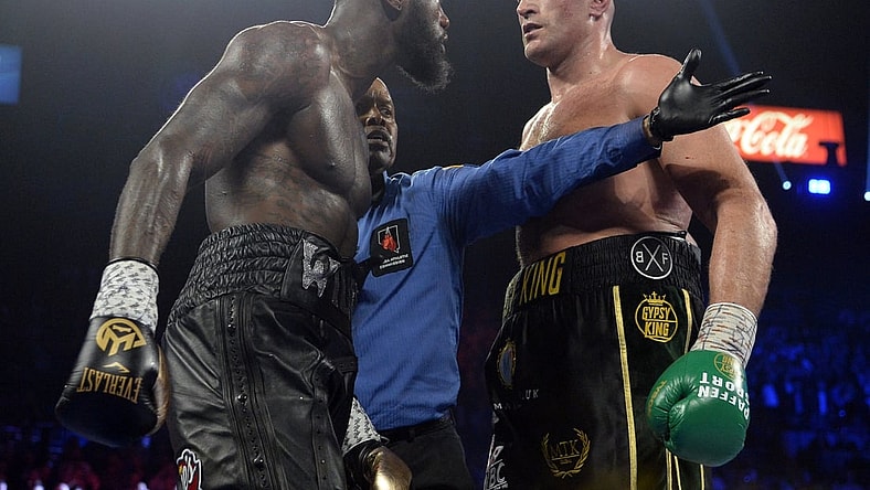 Feb 22, 2020; Las Vegas, Nevada, USA; Deontay Wilder and Tyson Fury stare at one another during their WBC heavyweight title bout at MGM Grand Garden Arena. Fury won via seventh round TKO. Mandatory Credit: Joe Camporeale-USA TODAY Sports