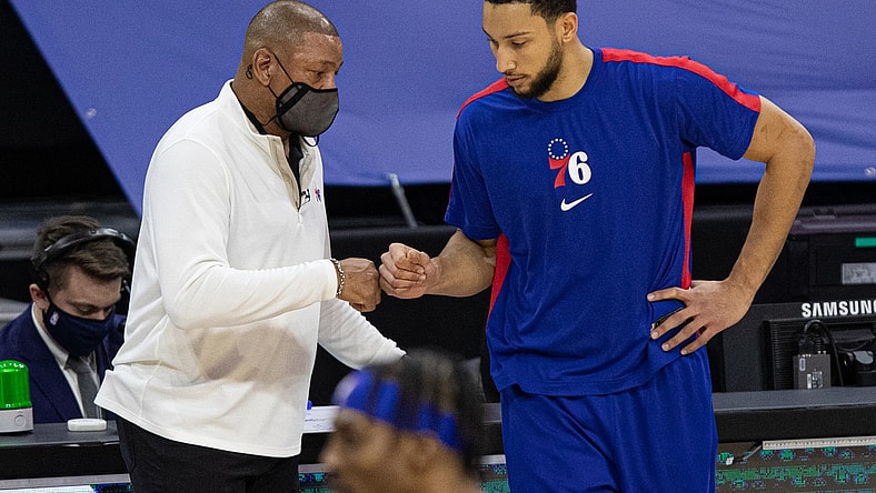Jan 27, 2021; Philadelphia, Pennsylvania, USA; Philadelphia 76ers guard Ben Simmons (R) fist bumps head coach Doc Rivers (L) before a game against the Los Angeles Lakers at Wells Fargo Center. Mandatory Credit: Bill Streicher-USA TODAY Sports