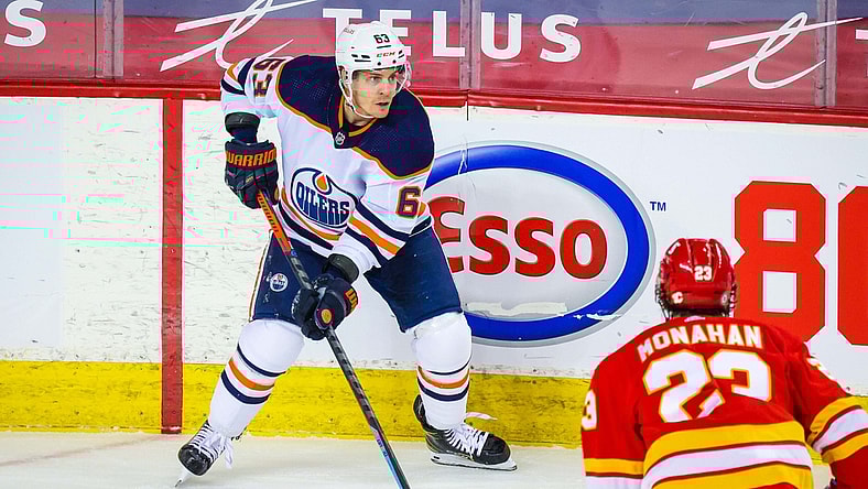 Mar 15, 2021; Calgary, Alberta, CAN; Edmonton Oilers left wing Tyler Ennis (63) controls the puck against the Calgary Flames during the second period at Scotiabank Saddledome. Mandatory Credit: Sergei Belski-USA TODAY Sports