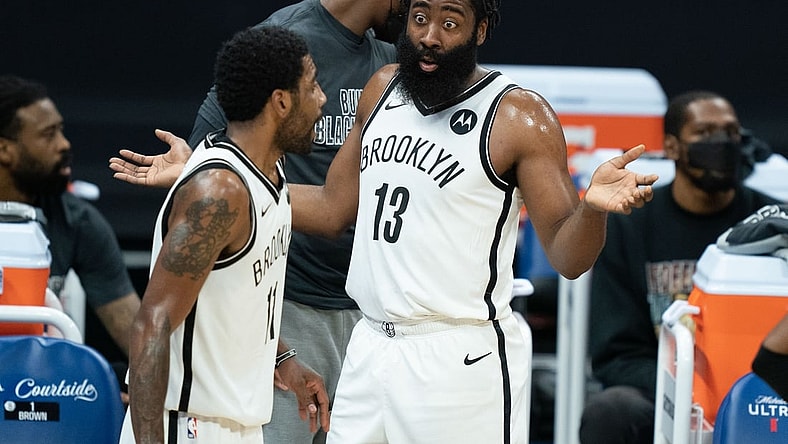 February 15, 2021; Sacramento, California, USA; Brooklyn Nets guard James Harden (13, right) and guard Kyrie Irving (11, left) during the first quarter against the Sacramento Kings at Golden 1 Center. Mandatory Credit: Kyle Terada-USA TODAY Sports