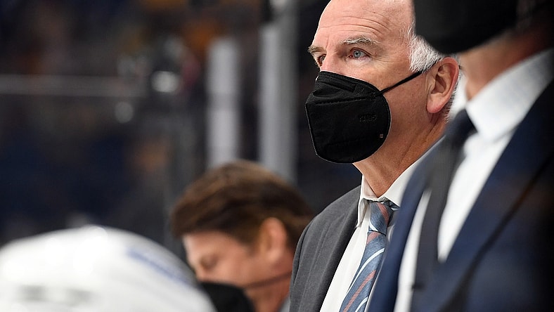 Apr 26, 2021; Nashville, Tennessee, USA; Florida Panthers head coach Joel Quenneville looks on from the bench during the second period against the Nashville Predators at Bridgestone Arena. Mandatory Credit: Christopher Hanewinckel-USA TODAY Sports