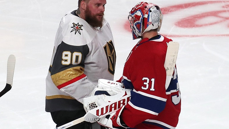 Jun 24, 2021; Montreal, Quebec, CAN; Montreal Canadiens goaltender Carey Price (31) and Vegas Golden Knights goaltender Robin Lehner (90) congratulate each other during an overtime period in game six of the 2021 Stanley Cup Semifinals at Bell Centre. Mandatory Credit: Jean-Yves Ahern-USA TODAY Sports