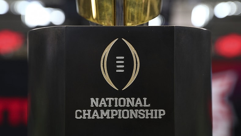 Jul 15, 2021; Arlington, TX, USA; The College Football playoff national championship trophy is displayed during Big 12 media days at AT&T Stadium. Mandatory Credit: Kevin Jairaj-USA TODAY Sports