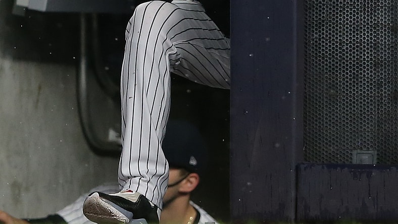 Jul 17, 2021; Bronx, New York, USA; New York Yankees manager Aaron Boone (19) watches during the sixth inning against the Boston Red Sox at Yankee Stadium. Mandatory Credit: Brad Penner-USA TODAY Sports