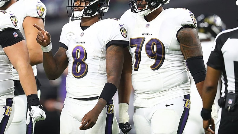 Sep 13, 2021; Paradise, Nevada, USA; Baltimore Ravens quarterback Lamar Jackson (8) and offensive tackle Ronnie Stanley (79) against the Las Vegas Raiders during Monday Night Football at Allegiant Stadium. Mandatory Credit: Mark J. Rebilas-USA TODAY Sports