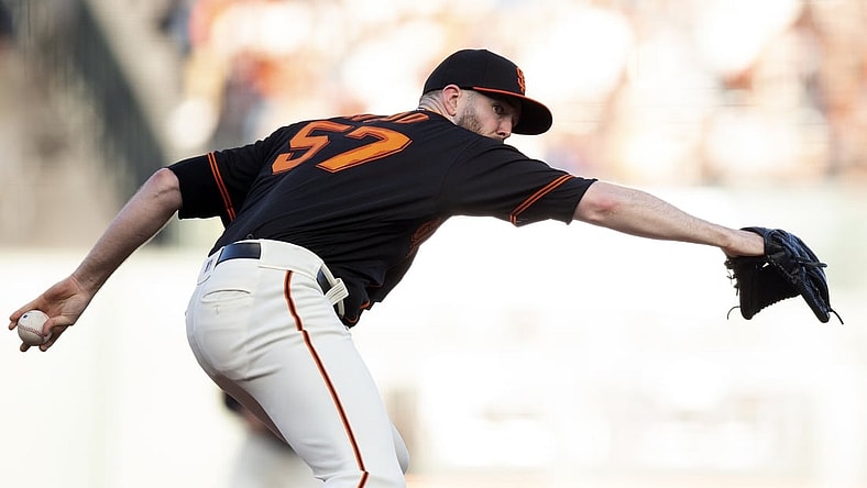 Sep 18, 2021; San Francisco, California, USA; San Francisco Giants starting pitcher Alex Wood (57) delivers against the Atlanta Braves during the first inning at Oracle Park. Mandatory Credit: D. Ross Cameron-USA TODAY Sports
