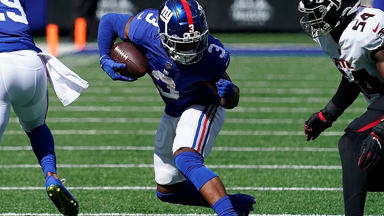 Sep 26, 2021; E. Rutherford, N.J., USA;  New York Giants wide receiver Sterling Shepard (3) carries the ball as Atlanta Falcons linebacker Foye Oluokun (54) defends in the first half at MetLife Stadium. Mandatory Credit: Robert Deutsch-USA TODAY Sports