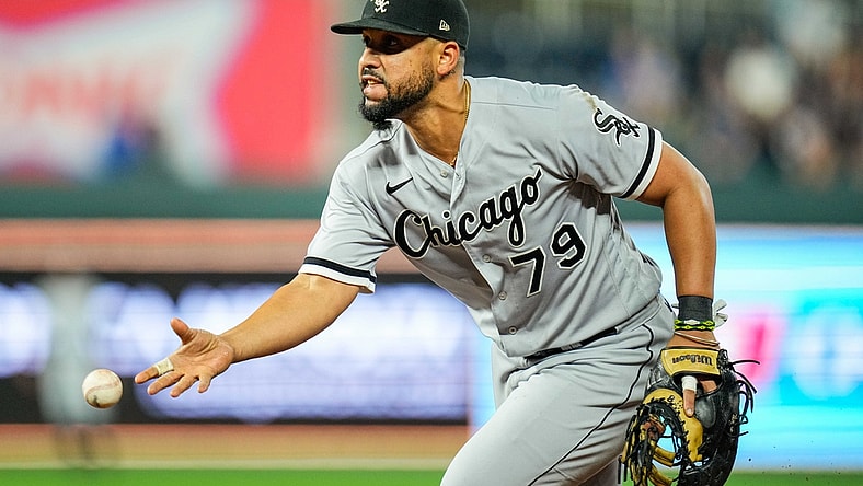 Sep 4, 2021; Kansas City, Missouri, USA; Chicago White Sox first baseman Jose Abreu (79) flips to first base against the Kansas City Royals during the ninth inning at Kauffman Stadium. Mandatory Credit: Jay Biggerstaff-USA TODAY Sports